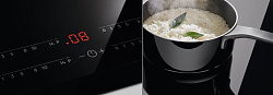 Индукционная варочная поверхность Electrolux EIT60443X черный