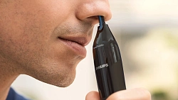 Триммер Philips Series 1000 NT1650/16 черный (насадок в компл:1шт)