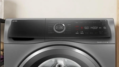 Стиральная машина Bosch Serie 8 WNC254ARSN пан.англ. загр.фронтальная макс.:10.5кг (с сушкой) серый
