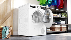 Сушильная машина Bosch Serie 6 WQG242AASN пан.швед. кл.энер.:A++ макс.загр.:9кг белый