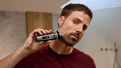 Бритва роторная Philips i9000 Prestige XP9202/10 реж.эл.:3 питан.:аккум. серебристый/черный